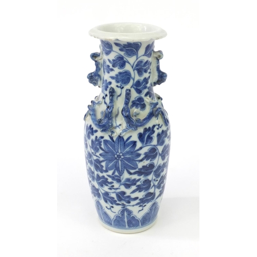 552 - Oriental Chinese porcelain vase hand painted with flowers and with animalia handles, 20cm high