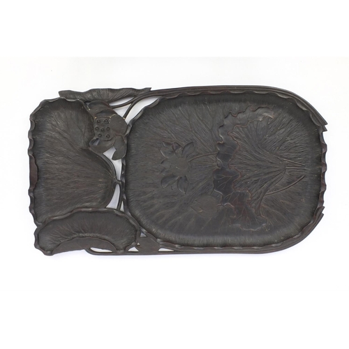 660 - Oriental Chinese hardwood sectional tray carved with lotus flowers, 79cm wide