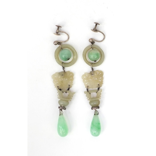 635 - Pair of oriental Chinese carved green jade drop earrings, each 9cm high