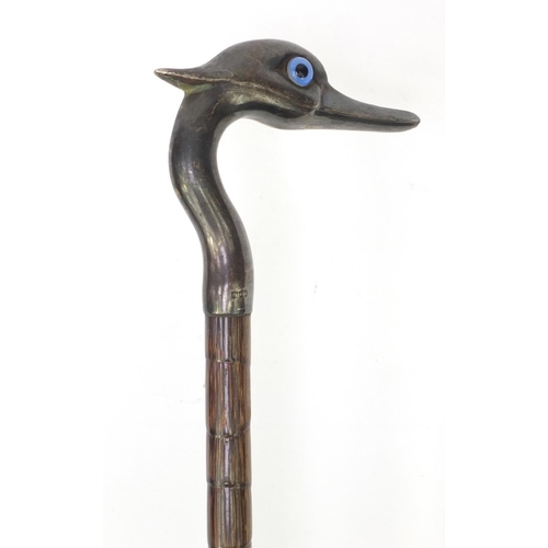 79 - Bamboo parasol with silver top in the form of a bird, with beaded eyes, London 1896, 91cm long