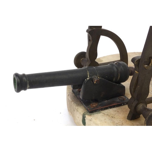 32 - 19th Century marble and bronze noon cannon with hours and co-ordinates, the marble base 20cm diamete... 