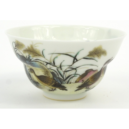 581 - Oriental Chinese porcelain tea bowl hand painted with birds, character marks to base, script to the ... 