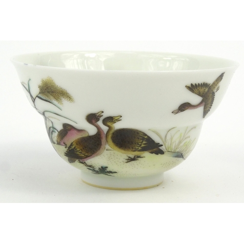 581 - Oriental Chinese porcelain tea bowl hand painted with birds, character marks to base, script to the ... 