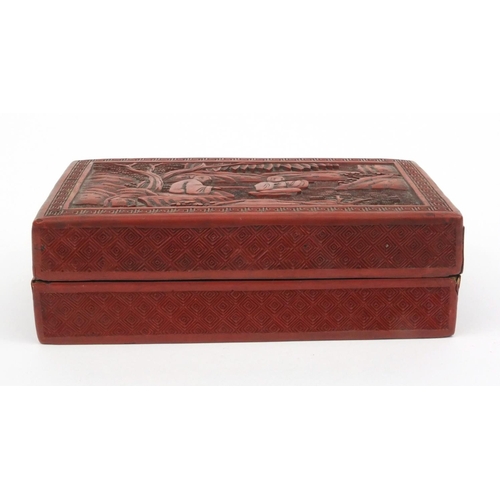 650 - Oriental Chinese cinnabar lacquer box and cover carved with figures, 19cm wide