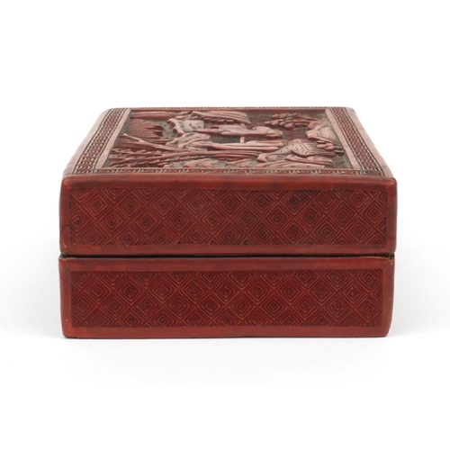 650 - Oriental Chinese cinnabar lacquer box and cover carved with figures, 19cm wide