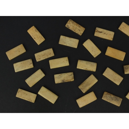 40 - Selection of prisoner of war bone dominoes, each 3cm wide