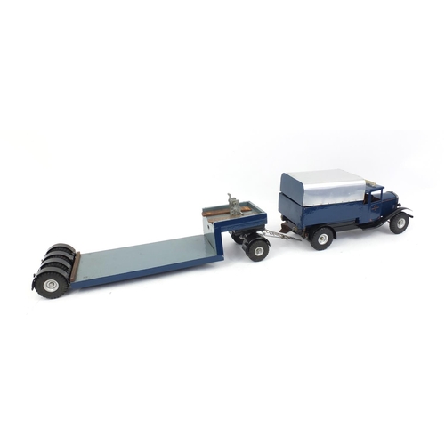 536 - Large tin plate and wooden scratch built model of a D.A Transport LTD pick up truck with trailer, ba... 