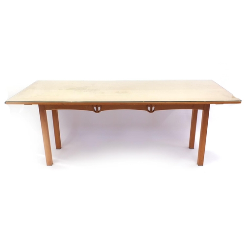 2005 - Charles Rennie McIntosh design light oak dining table, together with six dining chairs including two... 