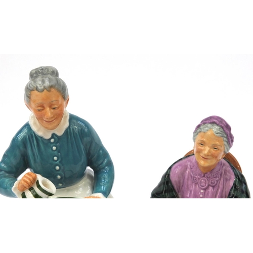 2057 - Two Royal Doulton figurines - The Favourite HN2249, together with The Family Album HN2321