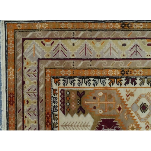 2022 - Rectangular Middle Eastern rug with geometric border, the central field decorated with geometric ser... 