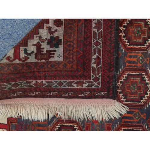 2038 - Rectangular Middle Eastern rug with geometric border, the central field decorated with a continuous ... 