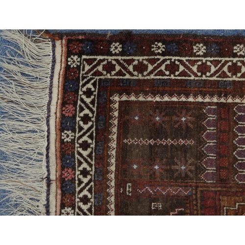 2042 - Rectangular Middle Eastern prayer mat with geometric and floral border, the central field decorated ... 