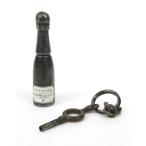 131 - Samson & Mordan Co propelling pencil in the form of a champagne bottle, 5cm long when closed