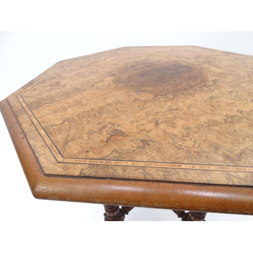 39 - Carved walnut octagonal occasional table with inlaid top, 62cm high x 61cm diameter