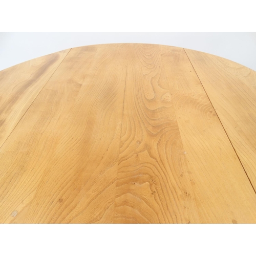 5 - Ercol light elm dropleaf dining table, 72cm high x 113cm wide