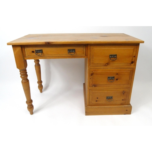 60 - Pine dressing table fitted with four drawers, 76cm high x 110cm wide x 51cm deep