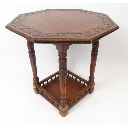 56 - Carved walnut octagonal occasional table with gallery undertier, 80cm high x 61cm diameter