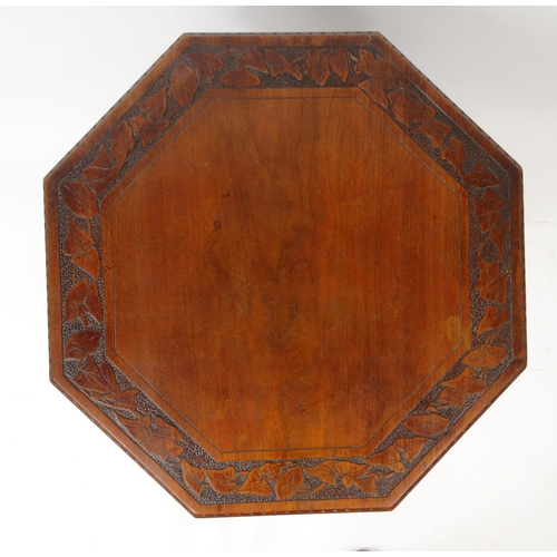56 - Carved walnut octagonal occasional table with gallery undertier, 80cm high x 61cm diameter
