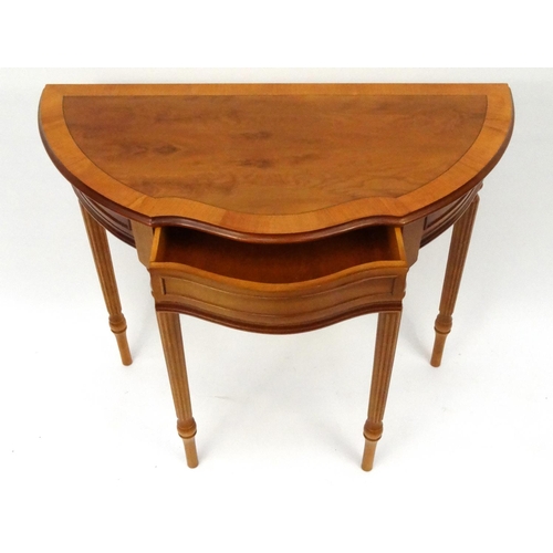 17 - Inlaid yew wood demi lune hall table with frieze drawer, 65cm high x 85cm wide x 42cm deep
