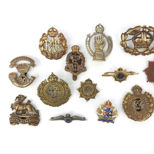 377 - Group of Military interest cap badges and brooches including a silver and enamel 'Inns of court' bro... 