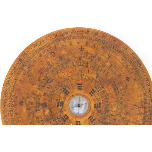 550 - Chinese wooden geomantic compass and perpetual calendar, character marks to the base, 16cm in diamet... 