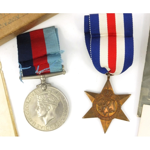 370 - British military interest World War II medals comprising the France and Germany star with original b... 