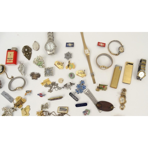 383 - Box of assorted costume jewellery, including wristwatches, locomotive pin badges, brooches, lighters... 