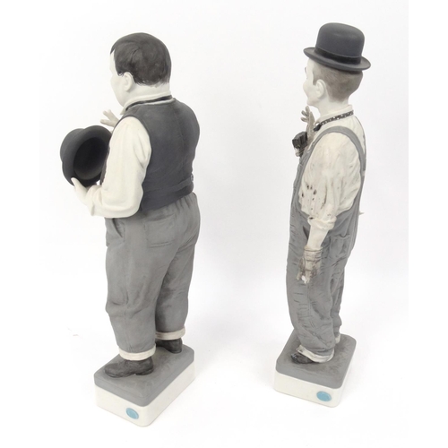 276 - A pair of limited edition Spanish porcelain Laurel and Hardy figures, number 147 and 150, the talles... 