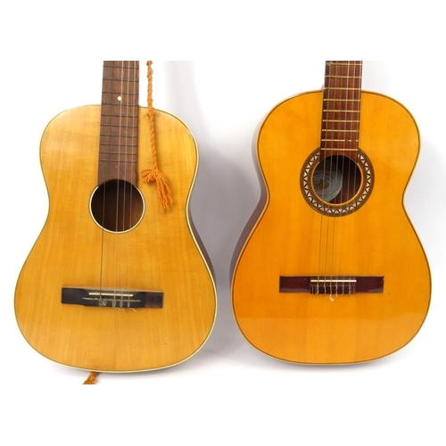 312 - Two unnamed wooden acoustic guitars