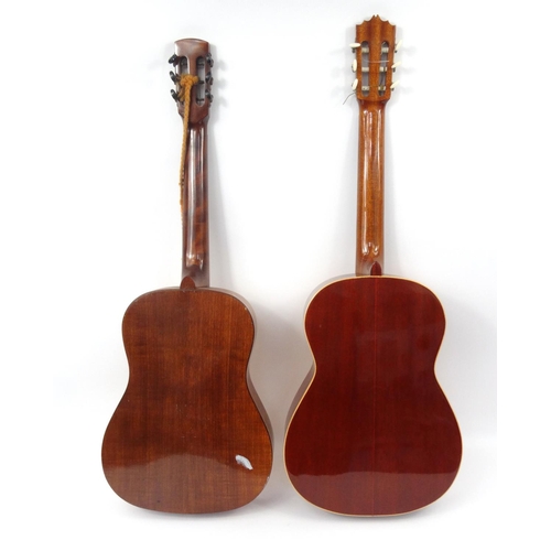 312 - Two unnamed wooden acoustic guitars