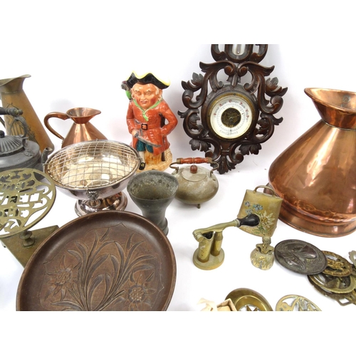 500 - Box of metal and wooden ornaments including a copper Gallon jug, carved barometer, bells, napkin rin... 