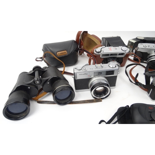 251 - Collection of cameras, lenses and accessories mostly range finder examples including Canon, Yashica ... 