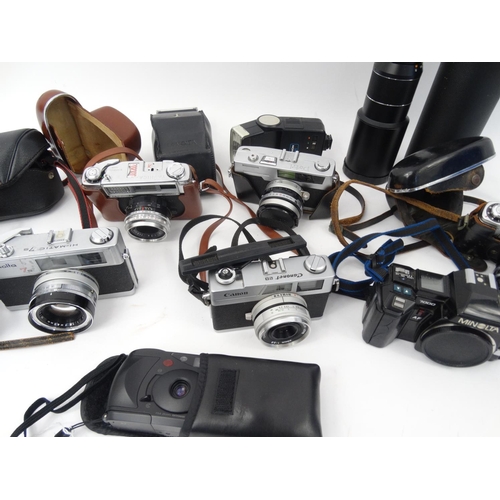 251 - Collection of cameras, lenses and accessories mostly range finder examples including Canon, Yashica ... 