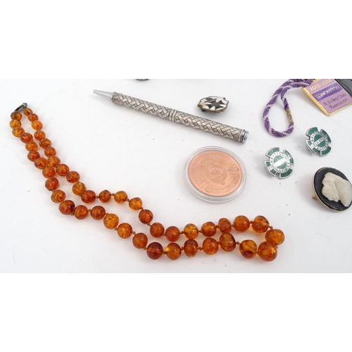 369 - Small selection of costume jewellery and enamelled badges including a silver and natural amber brooc... 