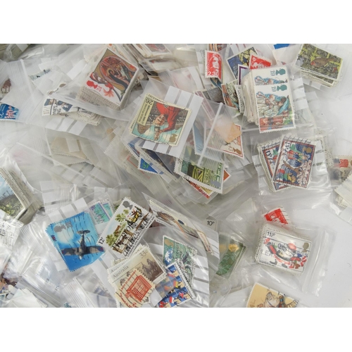 593 - Box of loose world stamps and Common wealth stamps