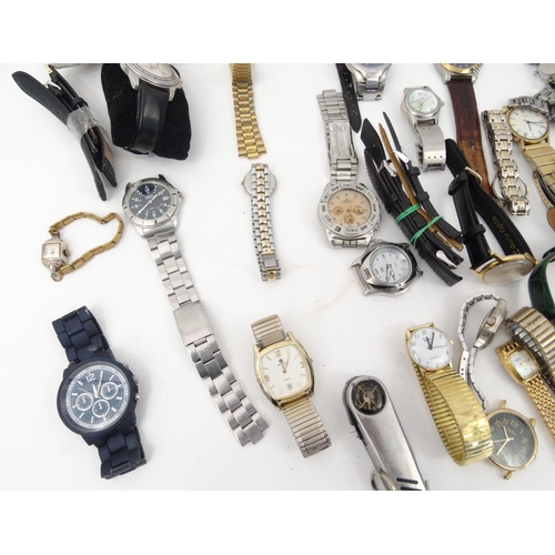 381 - Large selection of ladies and gentleman's wristwatches including Oris, Timex and Swatch examples