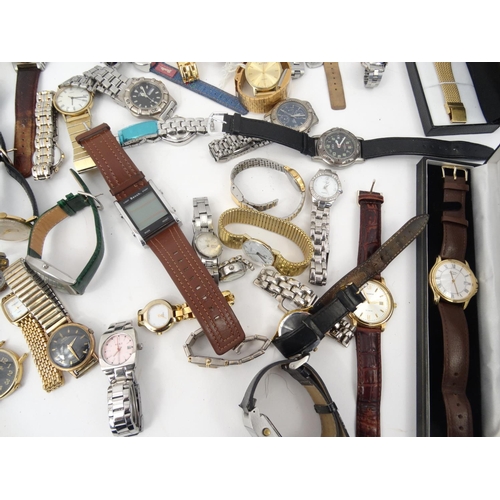 381 - Large selection of ladies and gentleman's wristwatches including Oris, Timex and Swatch examples