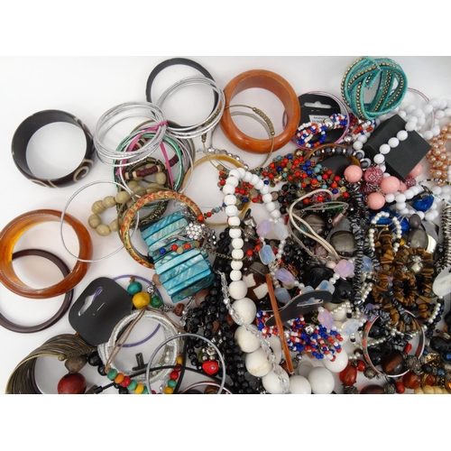 382 - Large selection of assorted costume jewellery including necklaces, bracelets, broaches etc