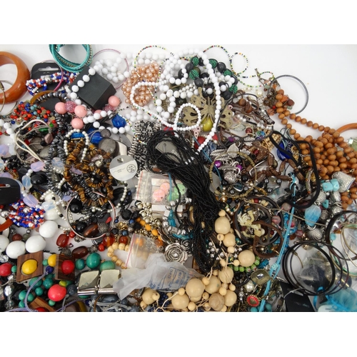 382 - Large selection of assorted costume jewellery including necklaces, bracelets, broaches etc