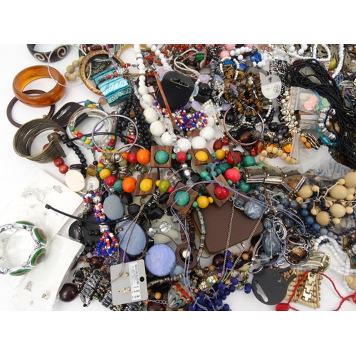 382 - Large selection of assorted costume jewellery including necklaces, bracelets, broaches etc