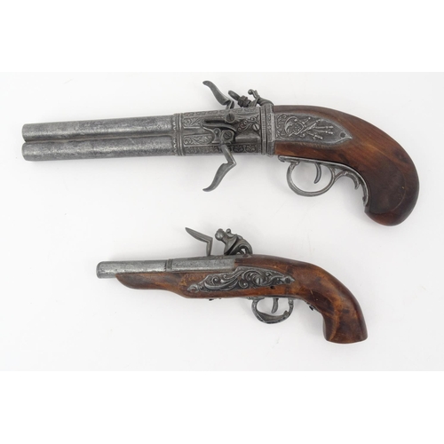 643 - Two decorative Flintlock pistols