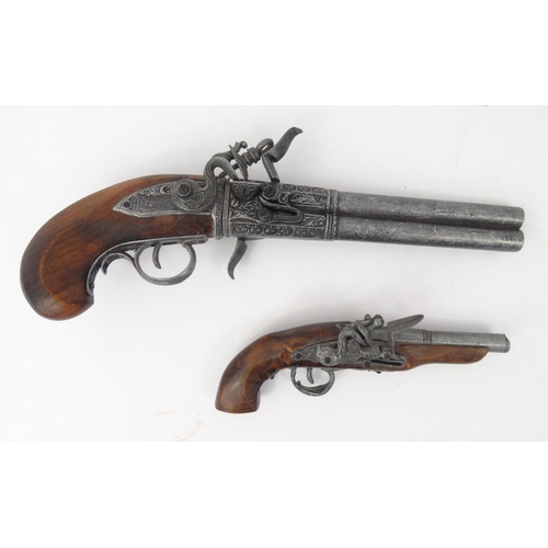 643 - Two decorative Flintlock pistols