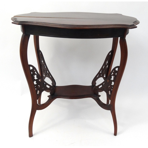 66 - Shaped mahogany occasional table with under tier, 70cm high x 69cm wide x 44cm deep