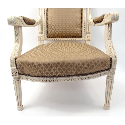 69 - French carved wooden elbow chair with beige upholstery