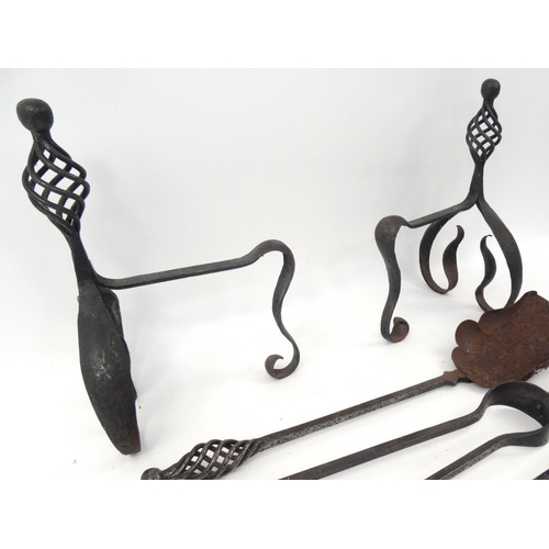 510 - Pair of Arts and Crafts wrought iron fire dogs with fire tools