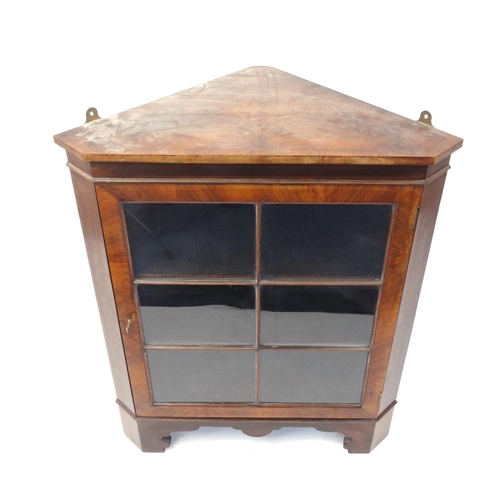 43 - Walnut corner cabinet with a glazed door, 94cm high x 77cm wide x 53cm deep