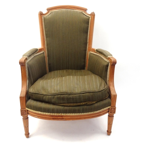 60 - Light wood open armchair with green striped upholstery