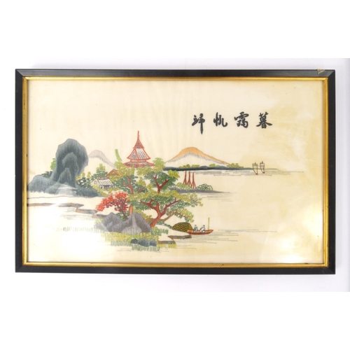 459 - Two framed Oriental silk pictures of a landscape and a bird on a branch