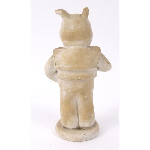 387 - Plaster figure of a pig, marked Artisco to the base, 17cm high