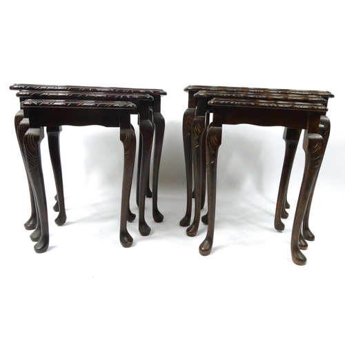 107 - Two nests of three inlaid mahogany occasional tables